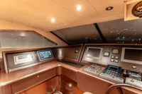 Luxurious yacht helm with advanced navigation systems, Custom Line 112, 2007 model.