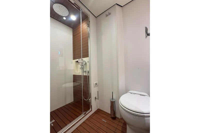  Yacht Photos Pics Luxurious bathroom on 2022 Azimut Fly 78 yacht with modern shower and toilet.