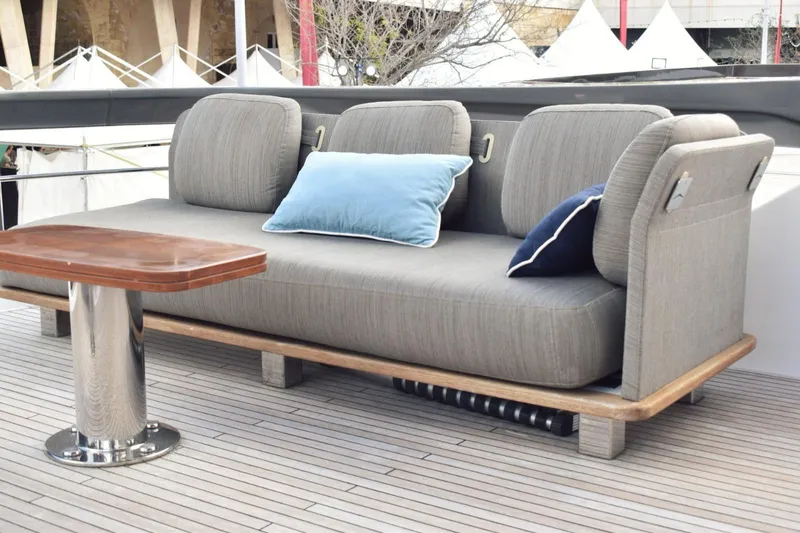  Yacht Photos Pics Luxurious seating on 2022 Azimut Fly 78 yacht with elegant cushions and wooden table.