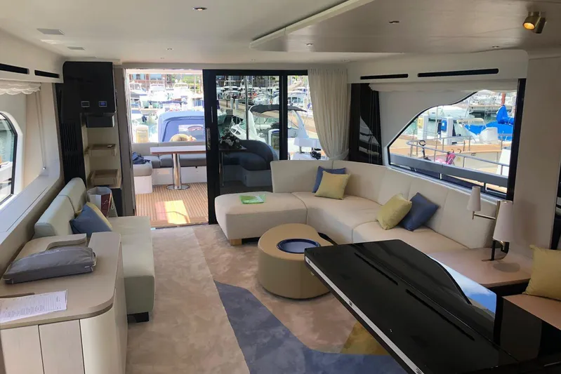  Yacht Photos Pics Luxurious interior of 2022 Azimut Fly 78 yacht with modern furnishings and marina view.