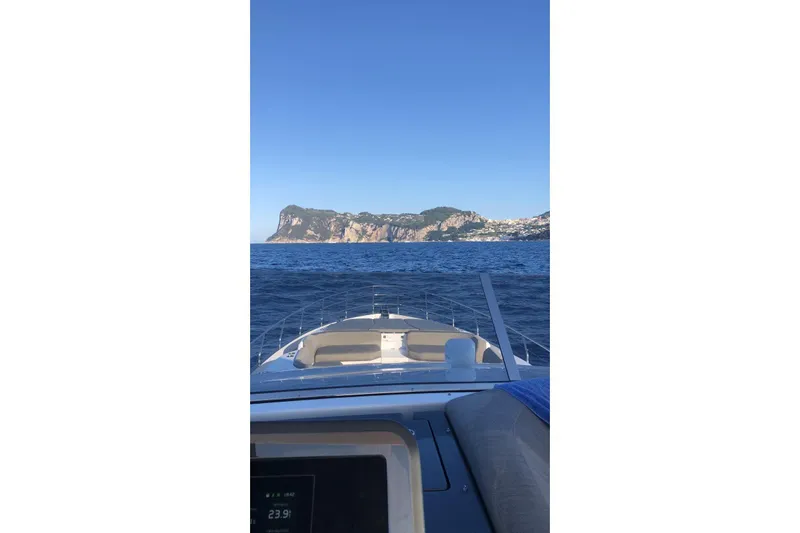  Yacht Photos Pics Azimut Fly 78 yacht cruising near scenic coastline, 2022 model.