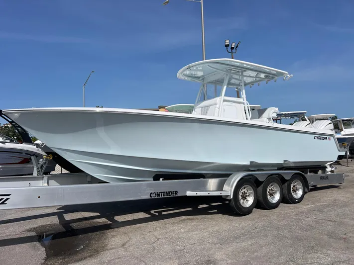  Yacht Photos Pics 2025 Contender 30 ST boat on trailer, sleek design, ready for adventure.
