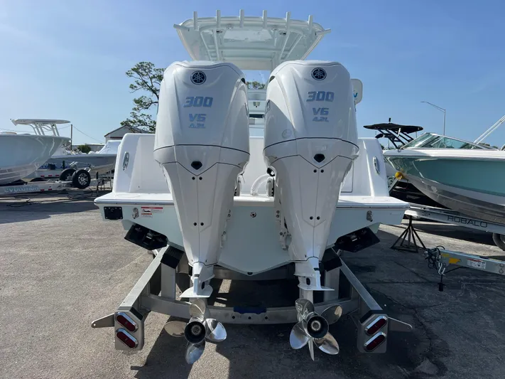  Yacht Photos Pics 2025 Contender 30 ST boat with dual 300 V6 engines, rear view.