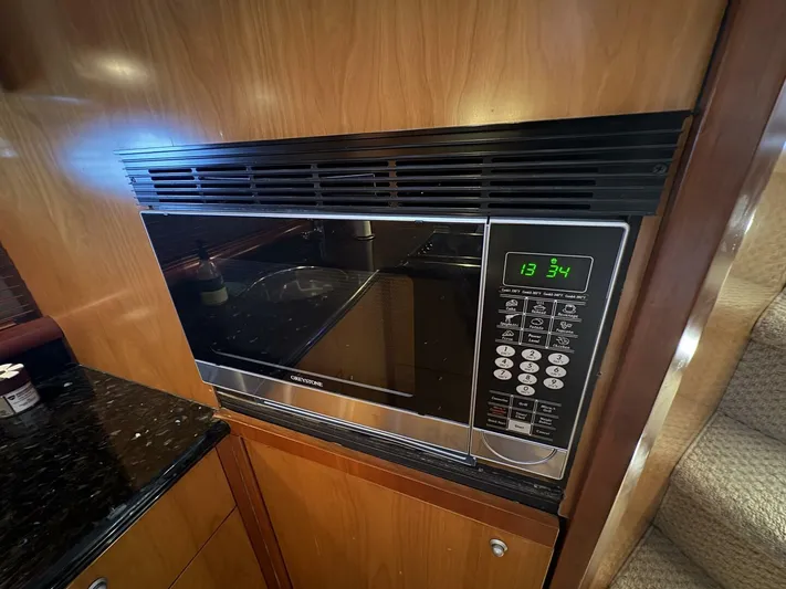 Prelude Yacht Photos Pics Built-in microwave in 2004 Sunseeker Manhattan 56 yacht kitchen.