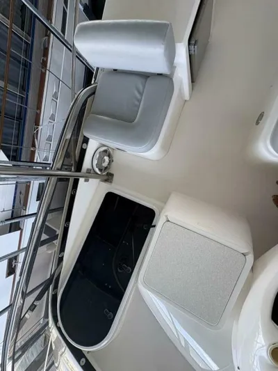 Prelude Yacht Photos Pics 2004 Sunseeker Manhattan 56 yacht interior with seating and hatch.