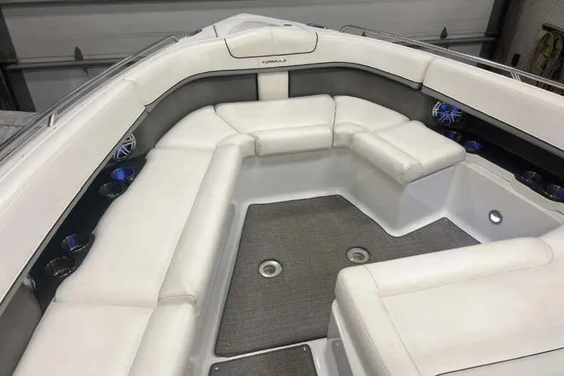  Yacht Photos Pics 2015 Formula 350 Crossover Bowrider with spacious white seating and modern interior design.