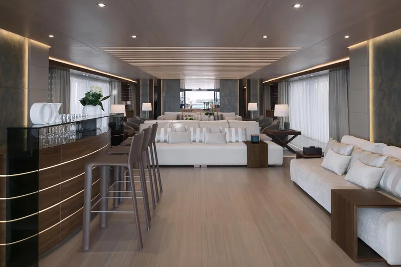 Utopia IV Yacht Photos Pics Luxurious interior of 2018 Rossinavi Custom yacht with modern bar and elegant seating area.