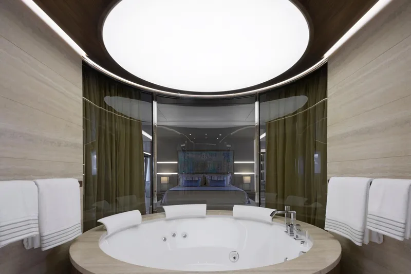 Utopia IV Yacht Photos Pics Luxurious Rossinavi Custom 2018 yacht interior with elegant circular bathtub and modern design.