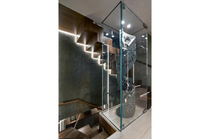 Utopia IV Yacht Photos Pics Modern spiral staircase with glass enclosure on Rossinavi Custom yacht, 2018 model.