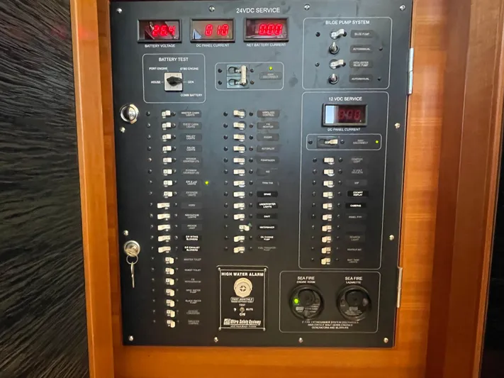 Resiliensea Yacht Photos Pics Electrical panel of 2014 Nordhavn 60 Toro Convertible yacht, featuring switches and gauges.