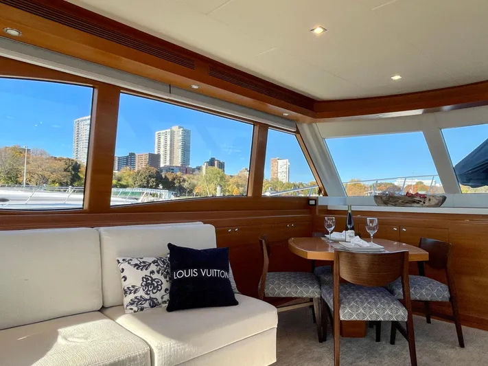 Resiliensea Yacht Photos Pics Luxurious 2014 Nordhavn 60 Toro Convertible yacht interior with cityscape view.
