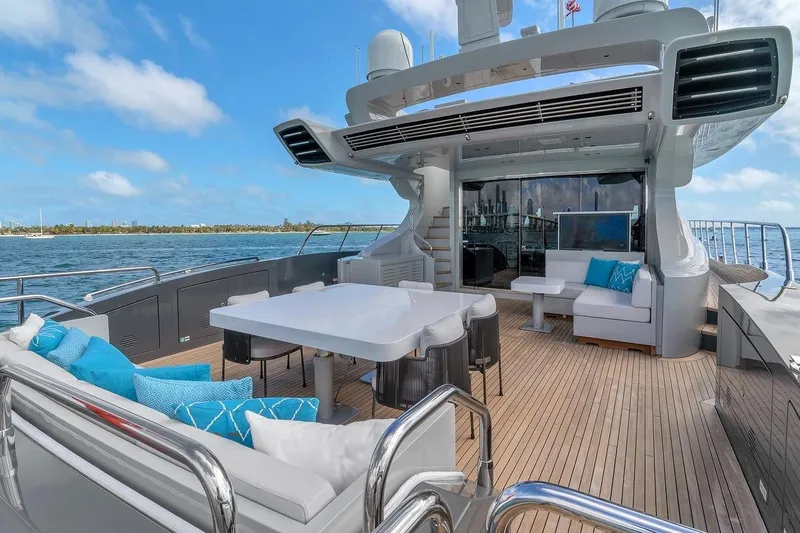 Nana I Yacht Photos Pics Luxurious 2020 Mangusta 110 Open yacht deck with elegant seating and ocean view.