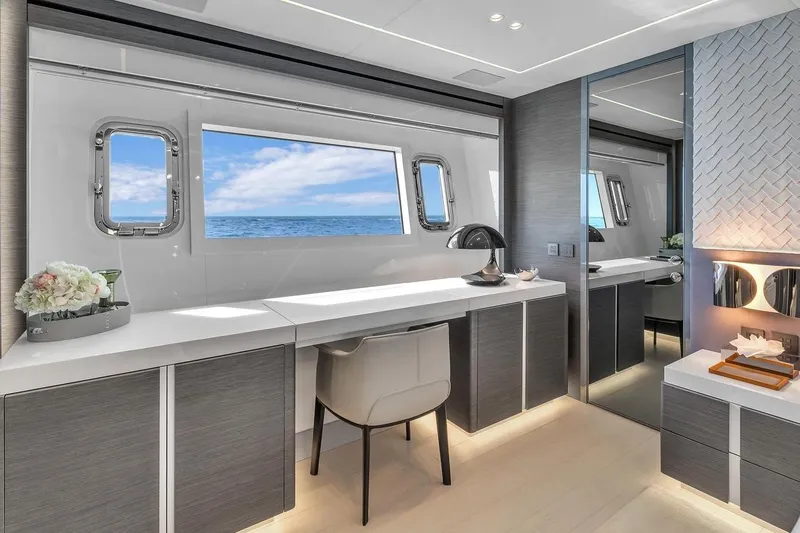 Nana I Yacht Photos Pics Luxurious interior of 2020 Mangusta 110 Open yacht with ocean view and modern decor.