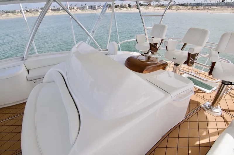 Serenity Now Yacht Photos Pics Luxurious 2014 Viking 66 Convertible yacht interior with ocean view and elegant seating.