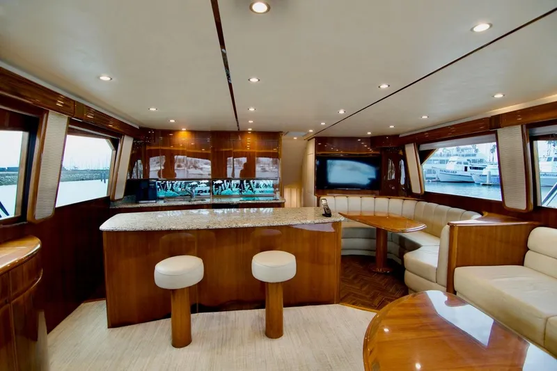 Serenity Now Yacht Photos Pics Luxurious interior of 2014 Viking 66 Convertible yacht with elegant seating and modern design.