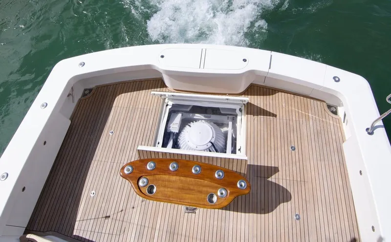 Serenity Now Yacht Photos Pics Viking 66 Convertible 2014 yacht deck with wooden flooring and fishing station.