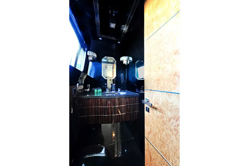  Yacht Photos Pics Luxurious bathroom interior on 2009 Maiora 32 yacht, featuring modern fixtures and elegant design.