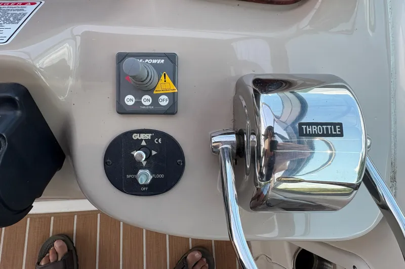  Yacht Photos Pics Control panel of a 2005 Sea Ray 340 Sundancer boat with throttle and switches.