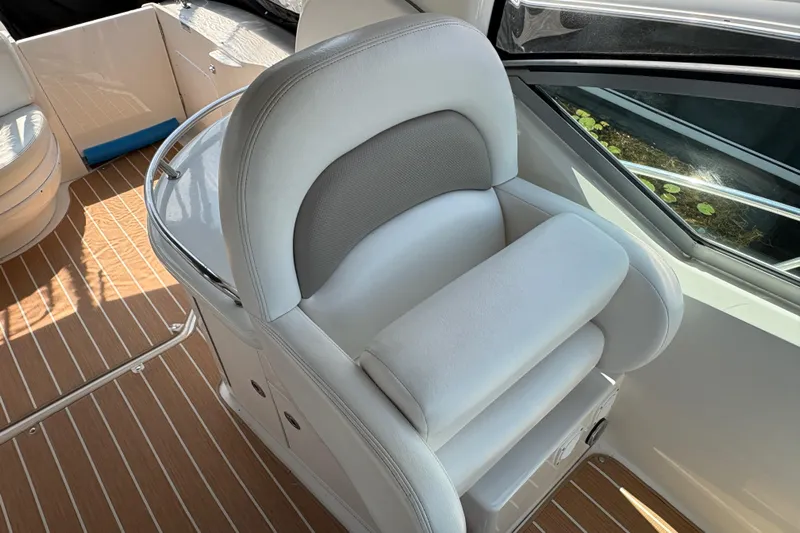  Yacht Photos Pics Luxury seating on 2005 Sea Ray 340 Sundancer boat with elegant interior design.