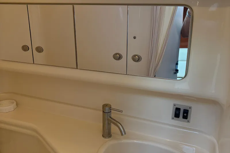  Yacht Photos Pics Bathroom vanity in 2005 Sea Ray 340 Sundancer yacht with mirror and faucet.