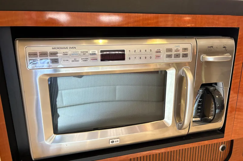  Yacht Photos Pics Built-in LG microwave and coffee maker on 2005 Sea Ray 340 Sundancer yacht.