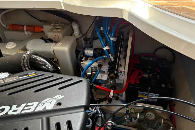  Yacht Photos Pics Engine compartment of a 2005 Sea Ray 340 Sundancer with visible components and wiring.