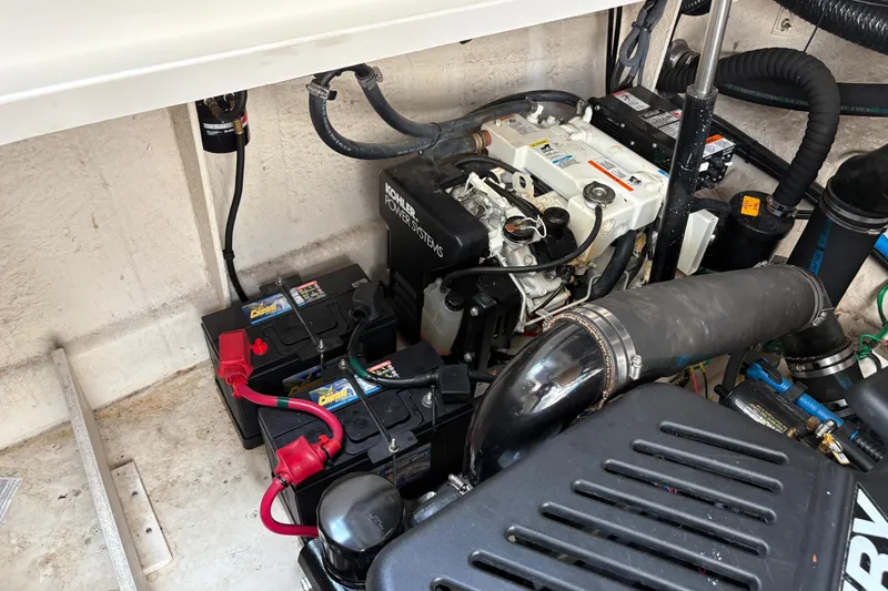  Yacht Photos Pics Engine compartment of a 2005 Sea Ray 340 Sundancer with batteries and Kohler power system.