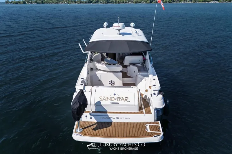  Yacht Photos Pics 2007 Regal Commodore 3760 IB yacht on water, rear view, luxury boating.