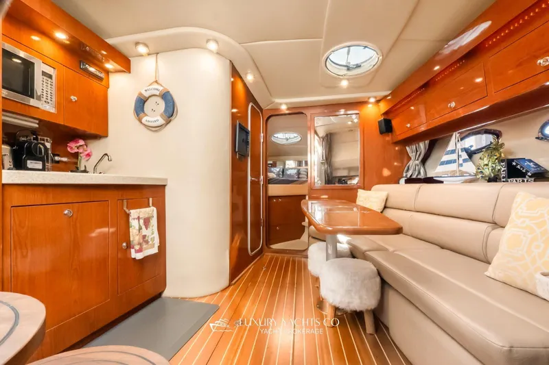  Yacht Photos Pics Luxurious interior of 2007 Regal Commodore 3760 IB yacht with modern amenities and elegant design.