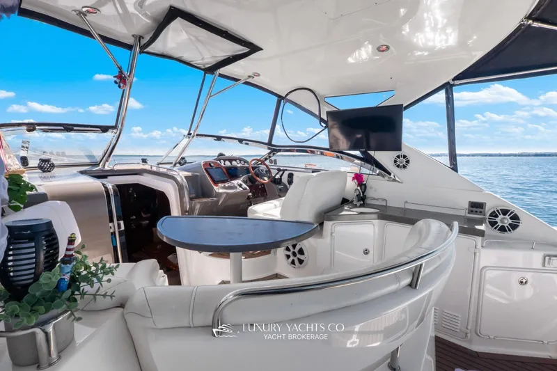  Yacht Photos Pics 2007 Regal Commodore 3760 IB yacht interior with luxurious seating and ocean view.