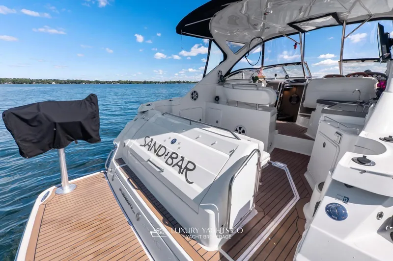  Yacht Photos Pics 2007 Regal Commodore 3760 IB yacht interior with open deck and seating, on a sunny day.