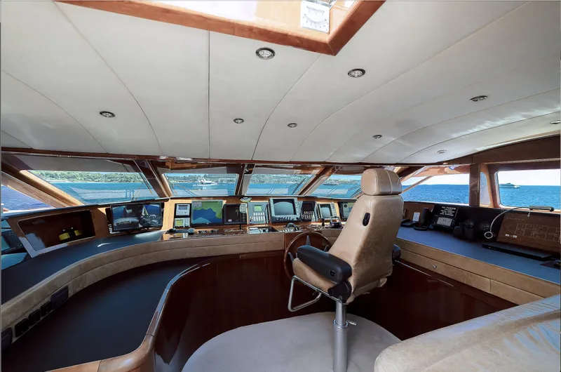 Theion Yacht Photos Pics Luxurious Baglietto 31m yacht cockpit, 1997 model, featuring advanced navigation systems and panoramic ocean views.