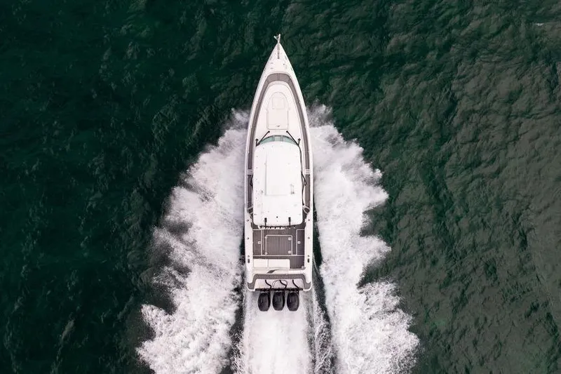  Yacht Photos Pics Aerial view of 2008 Donzi 38 ZSF boat cruising on open water.