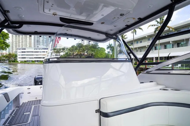  Yacht Photos Pics 2008 Donzi 38 ZSF boat interior with modern seating and waterfront view.