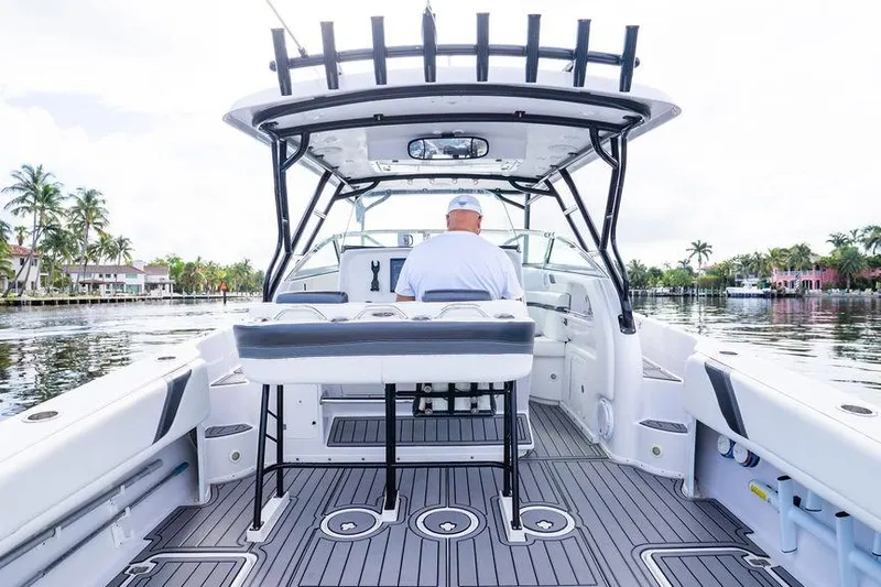  Yacht Photos Pics 2008 Donzi 38 ZSF boat interior with captain, on a scenic waterway.