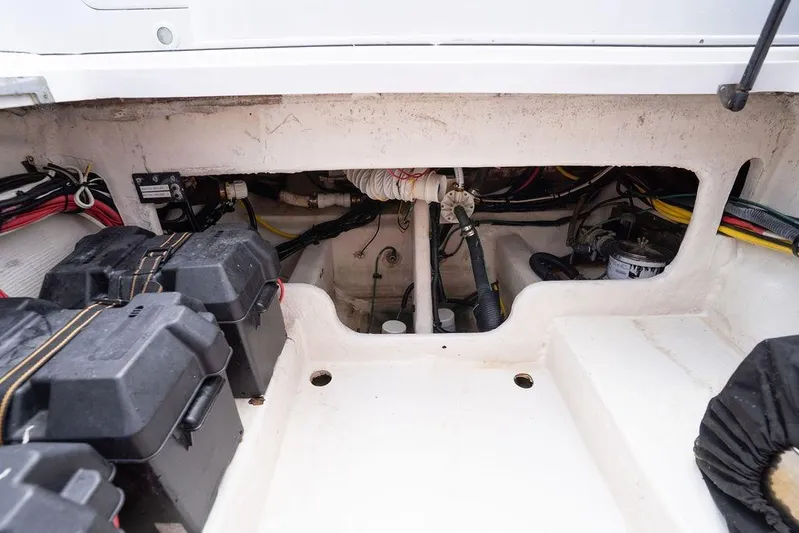  Yacht Photos Pics Engine compartment of a 2008 Donzi 38 ZSF boat, showing batteries and wiring.