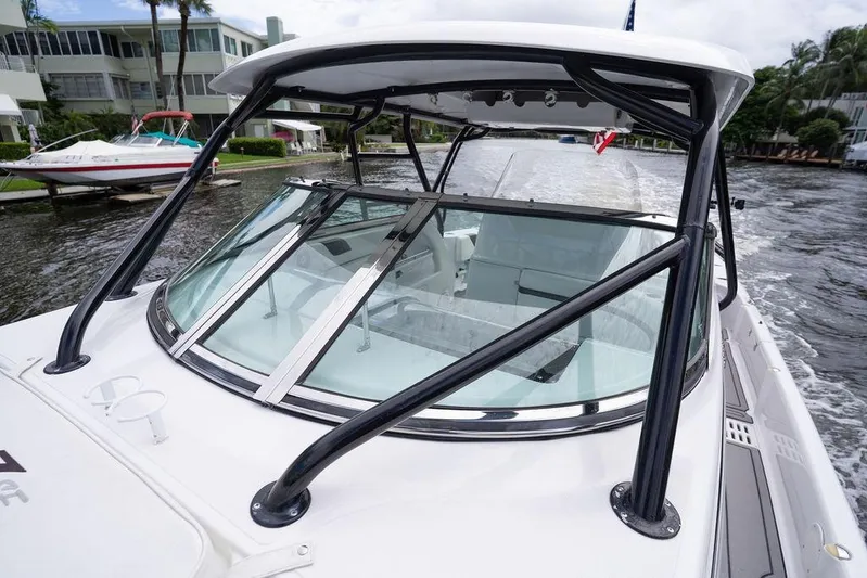  Yacht Photos Pics 2008 Donzi 38 ZSF boat cruising on a waterway, featuring sleek design and sturdy frame.