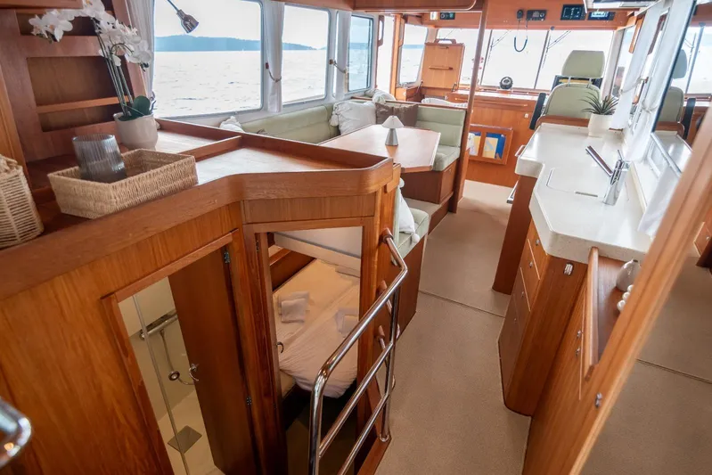 Gala Yacht Photos Pics Luxurious interior of 2019 Targa 46 yacht with wood finishes and modern amenities.