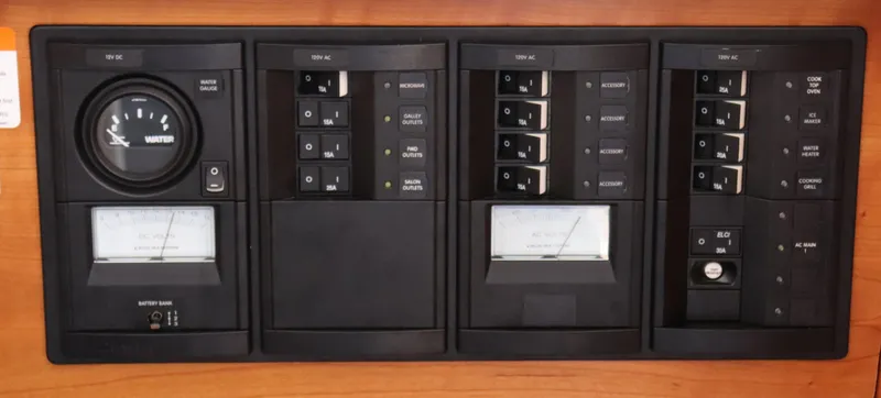 The Islander Yacht Photos Pics Control panel of a 2018 Cutwater C-302 Coupe boat, featuring various gauges and switches.