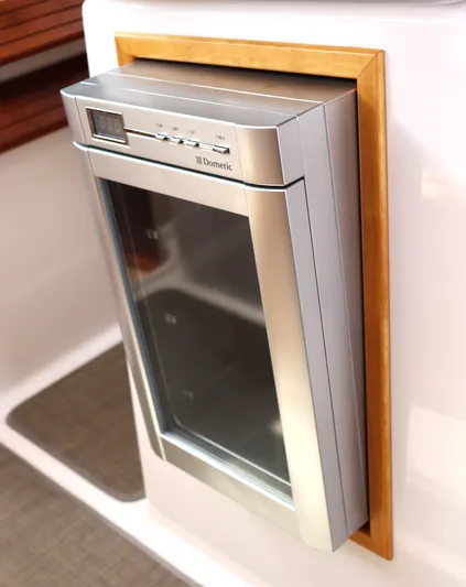 The Islander Yacht Photos Pics Built-in Dometic fridge in 2018 Cutwater C-302 Coupe boat interior.
