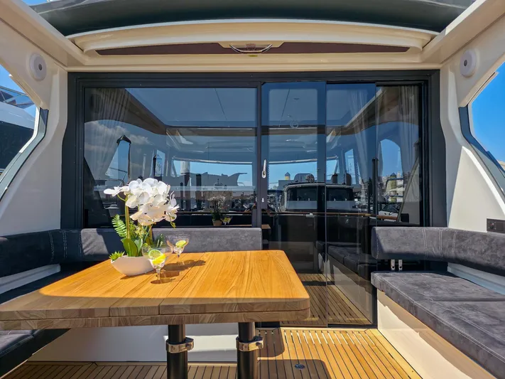  Yacht Photos Pics Luxurious Marex 440 yacht interior with elegant seating and wooden table, 2026 model.
