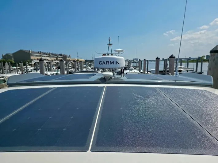  Yacht Photos Pics 2026 Marex 440 yacht with solar panels and Garmin equipment at a marina.
