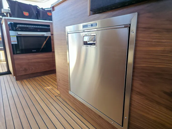  Yacht Photos Pics Modern kitchen interior on 2026 Marex 440 yacht with stainless steel appliances.