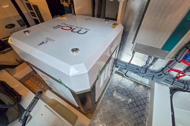  Yacht Photos Pics Engine room of 2026 Marex 440 boat with modern equipment and wiring.