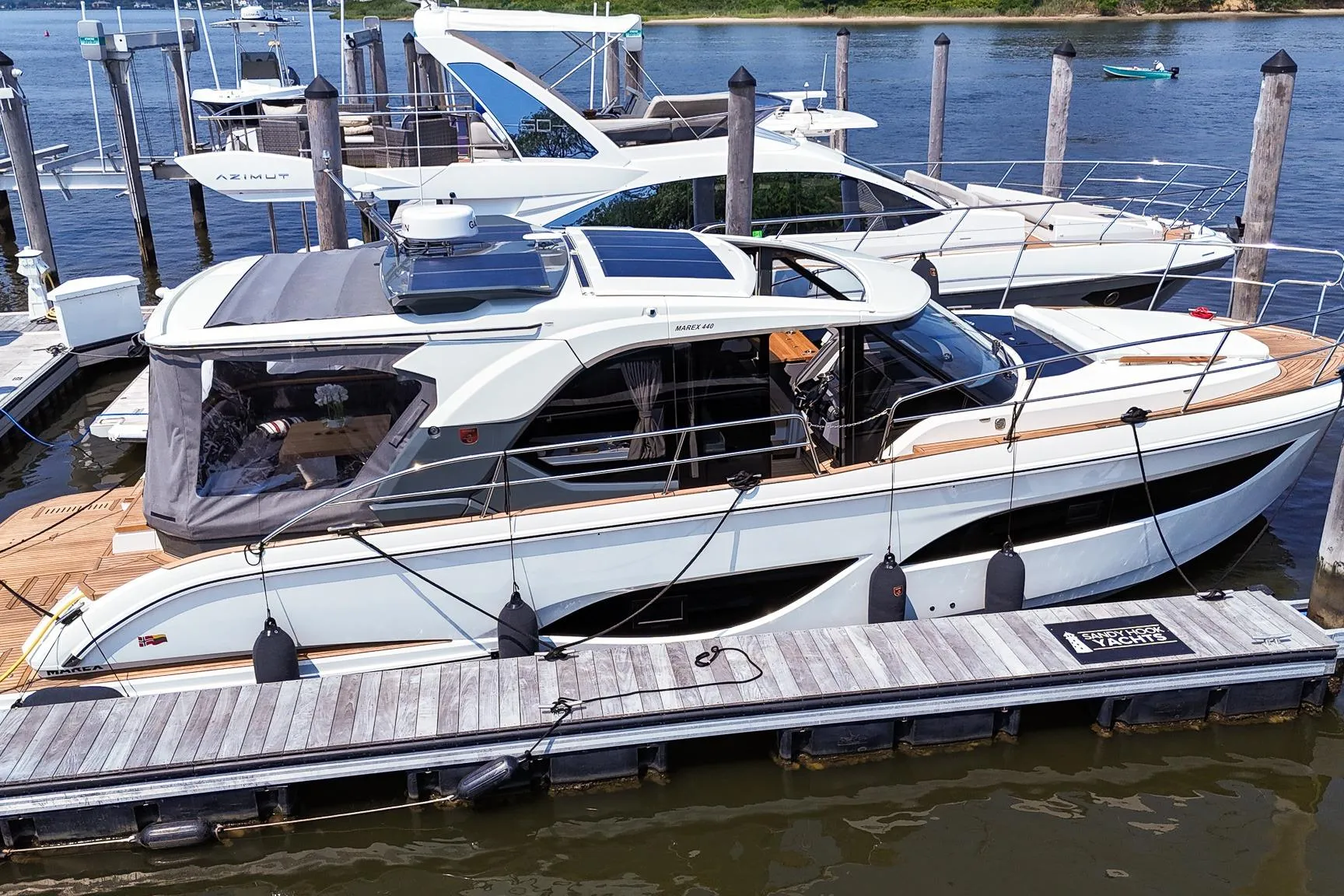 2026 Marex 440 yacht docked at marina, showcasing sleek design and modern features.