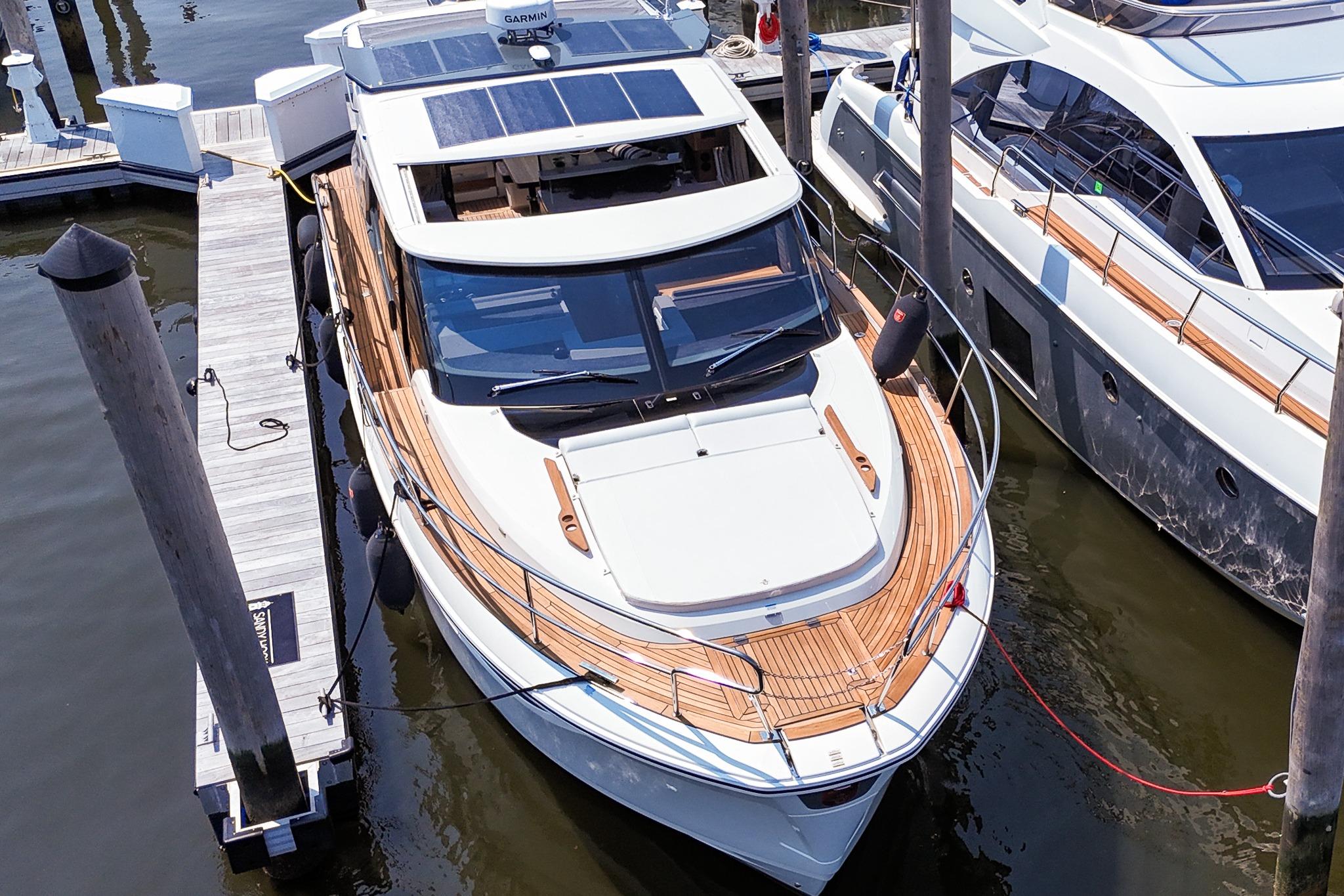 Luxury Marex 440 yacht docked, showcasing sleek design and modern features, 2026 model.