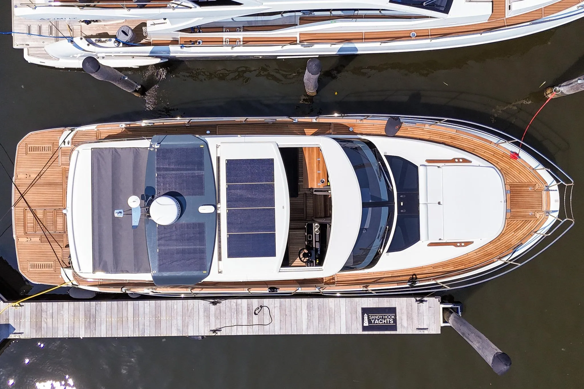 Top view of 2026 Marex 440 yacht docked at a marina.