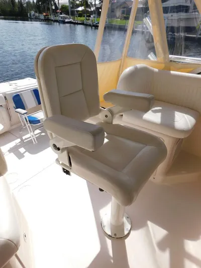  Yacht Photos Pics 2008 Grady-White Express 360 boat interior with white captain's chair and seating.