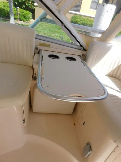  Yacht Photos Pics 2008 Grady-White Express 360 boat interior with foldable table and seating.