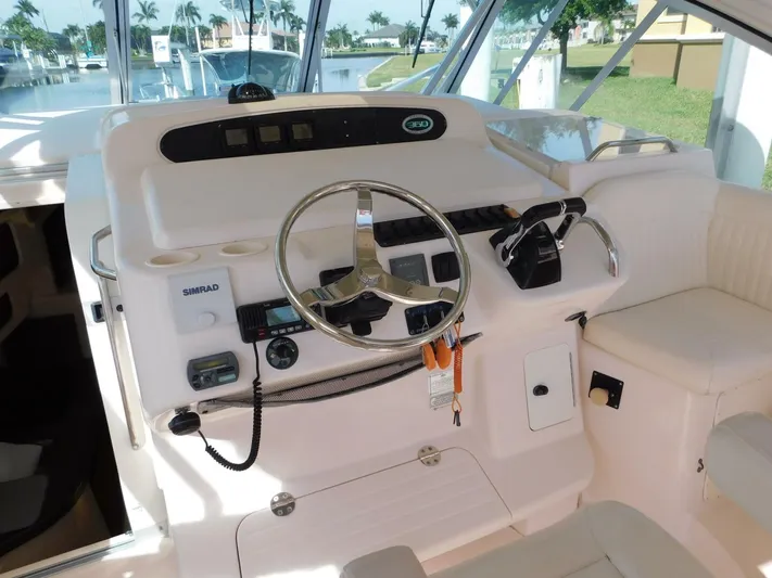  Yacht Photos Pics 2008 Grady-White Express 360 helm with steering wheel and controls.